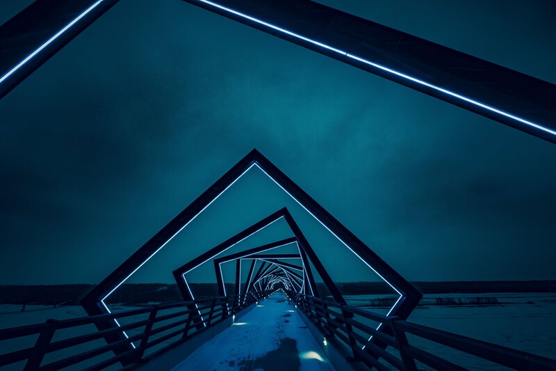 Neon-lit bridge tunnel