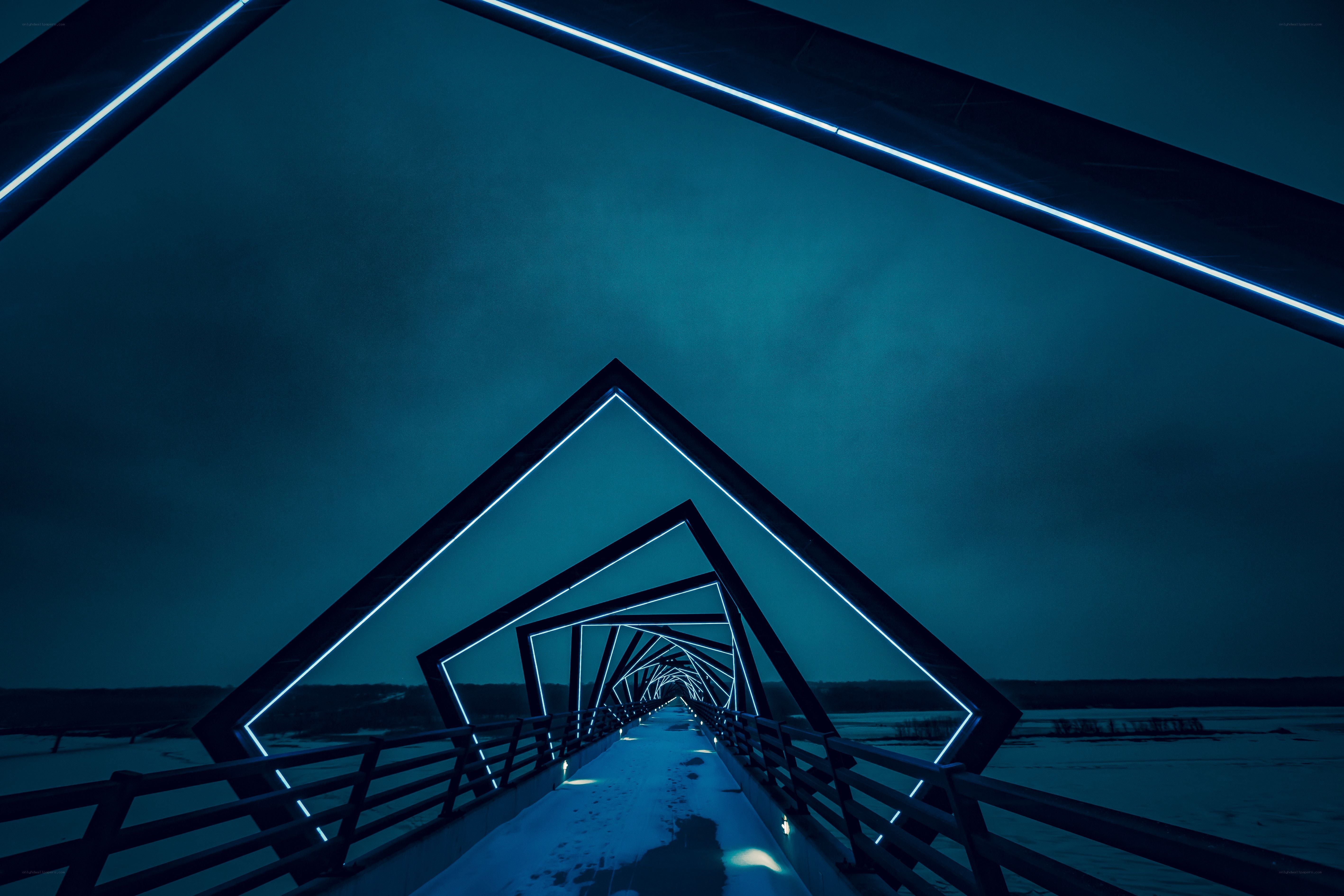 Neon-lit bridge tunnel