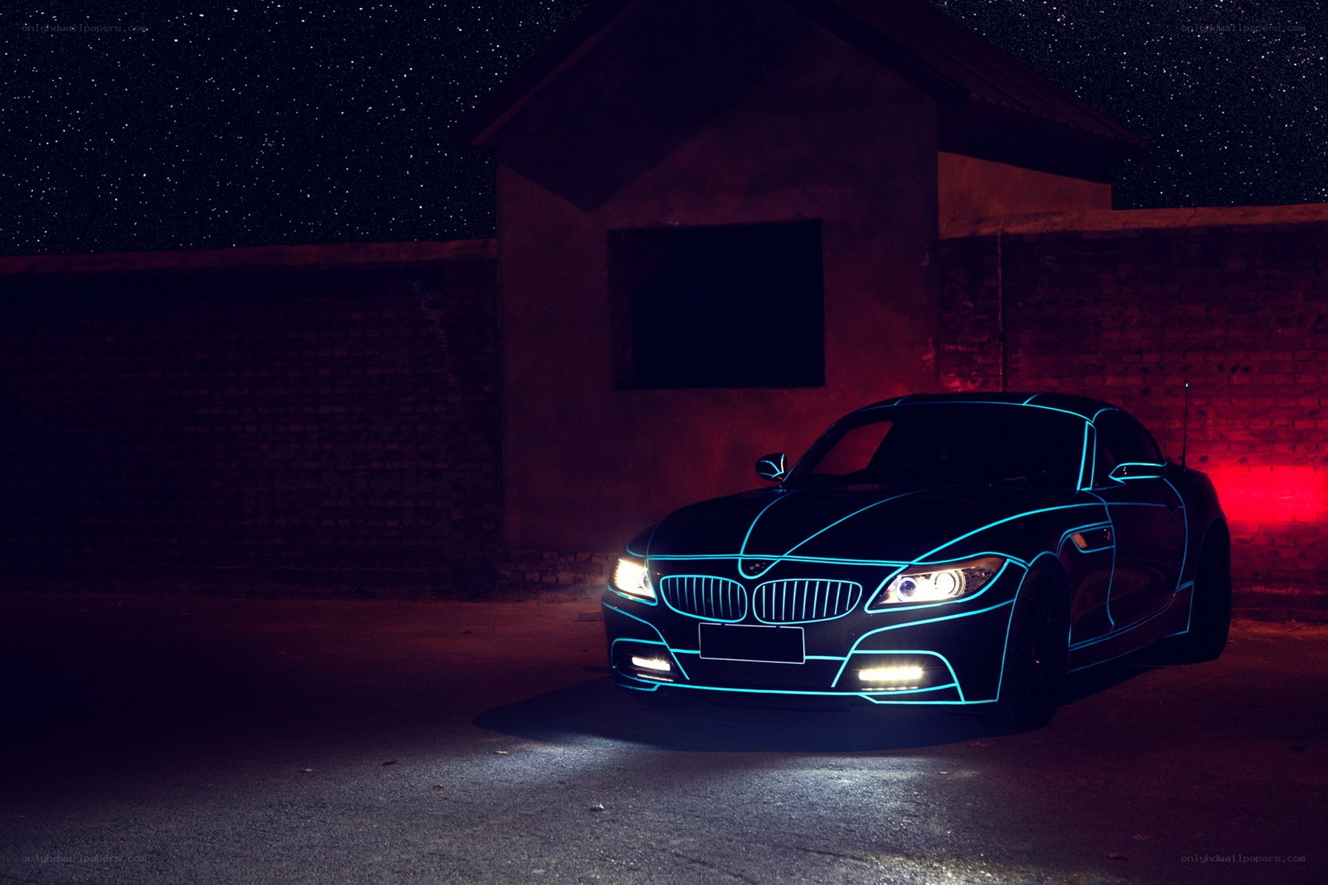 Neon-lit car at night