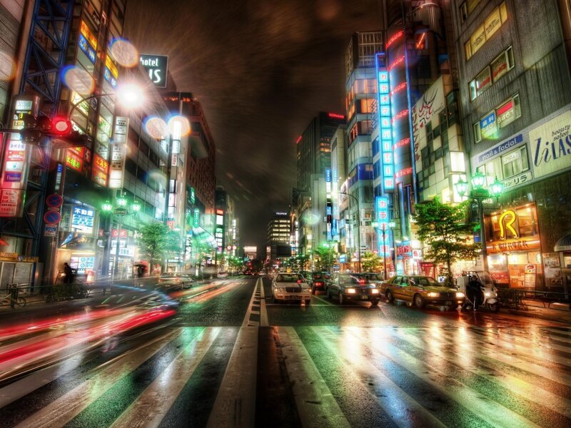neon-lit city street at night