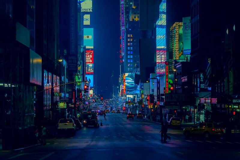 neon-lit city street at night