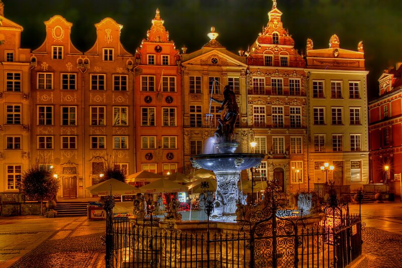 Neon-lit fountain at night