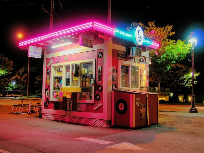 Neon-lit Kiosk at Night