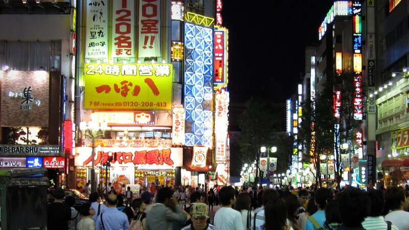 Neon-lit street at night in Japan