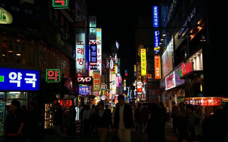 Neon-lit street at night in Seoul