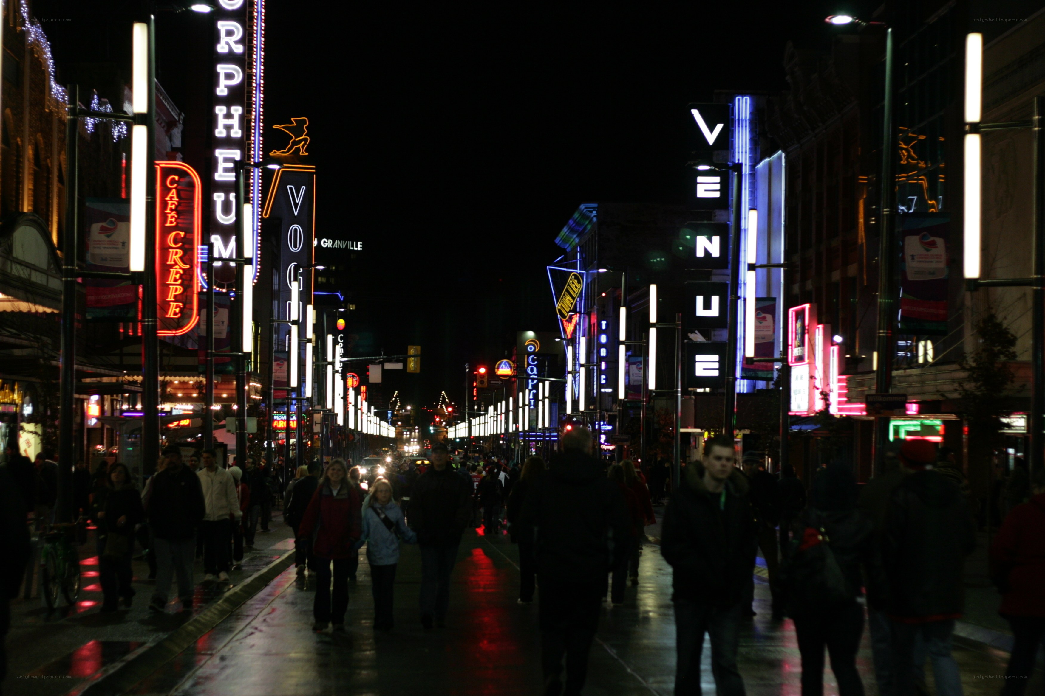 Neon-lit street at night