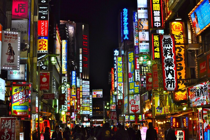 Neon-lit street in Tokyo at night