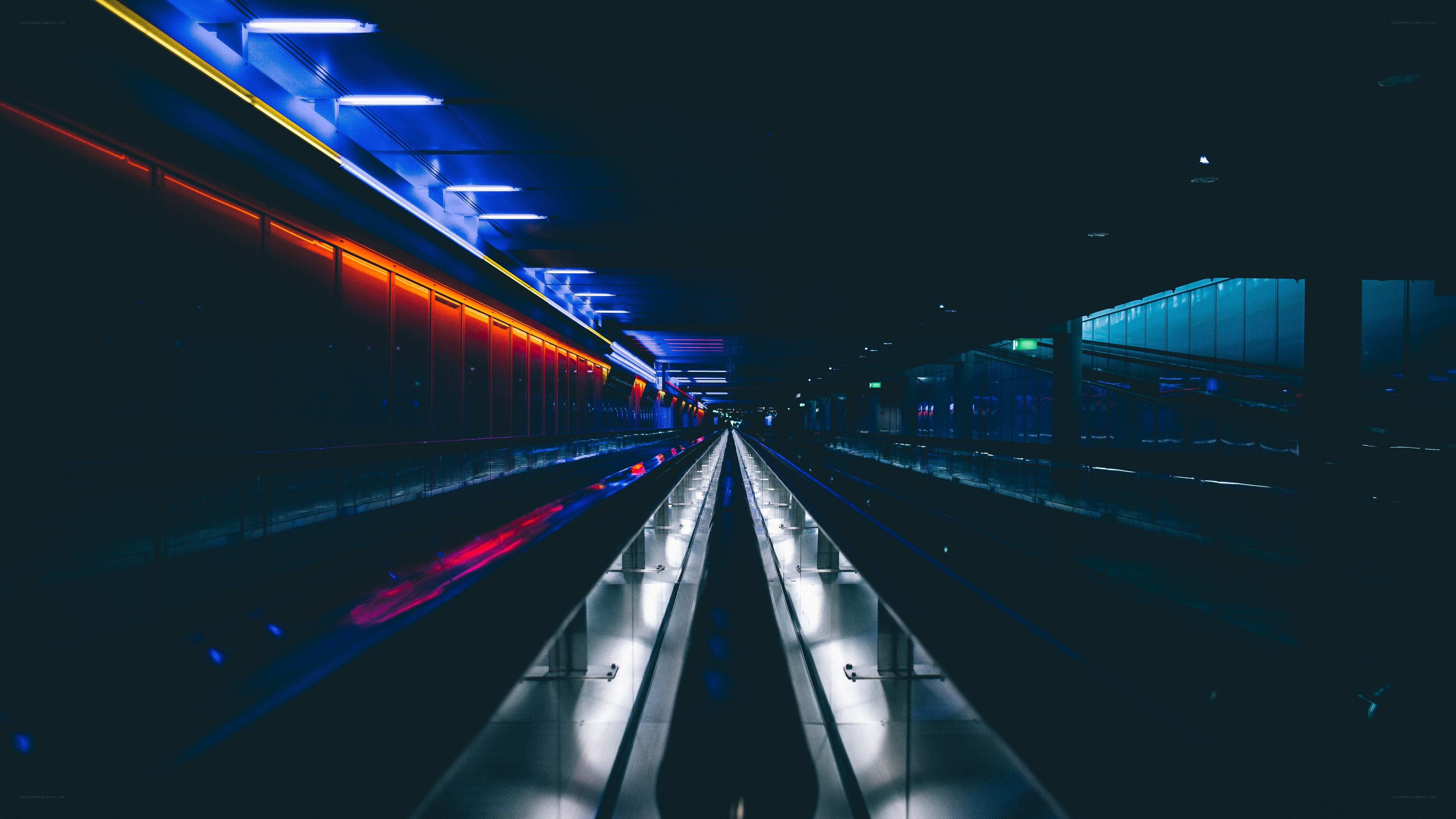 Neon-lit subway tunnel