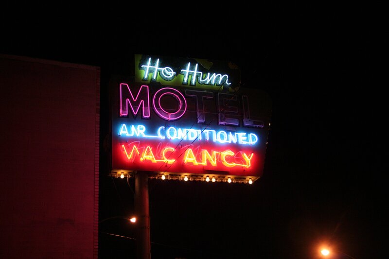 neon motel sign at night