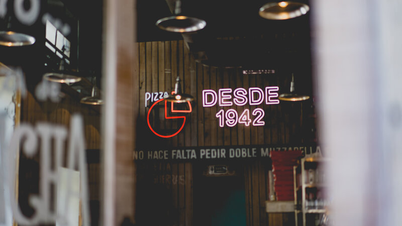 Neon sign in restaurant window