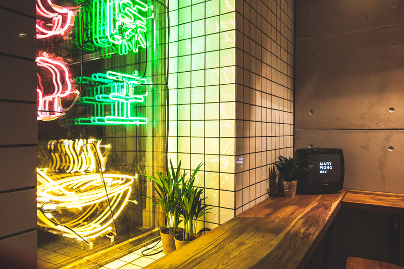 Neon Sign in Window — Green