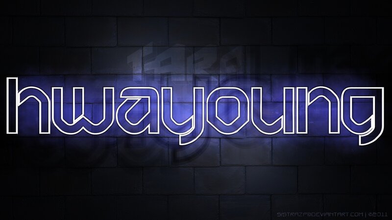 neon sign on brick wall