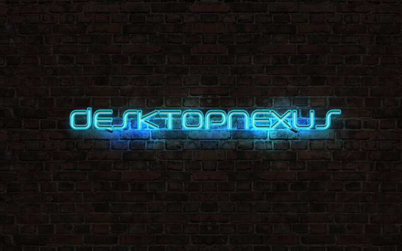 neon sign on brick wall
