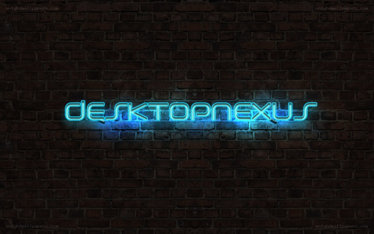 neon sign on brick wall