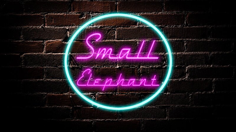 Neon Sign on Brick Wall — Pink