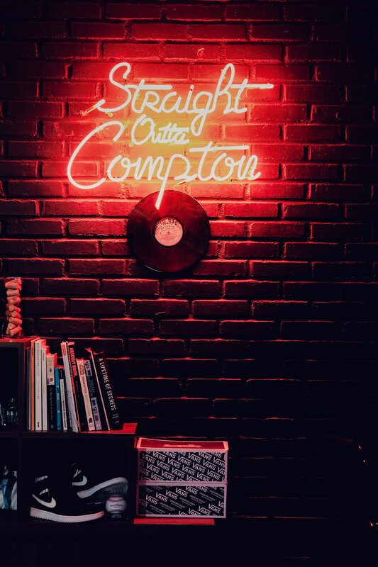 Neon Sign on Brick Wall — Red, Dark