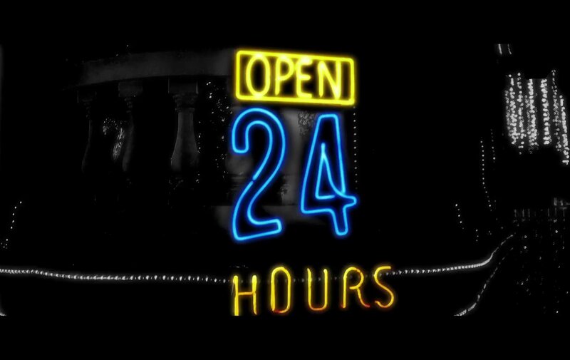 Neon Sign on Building — Yellow