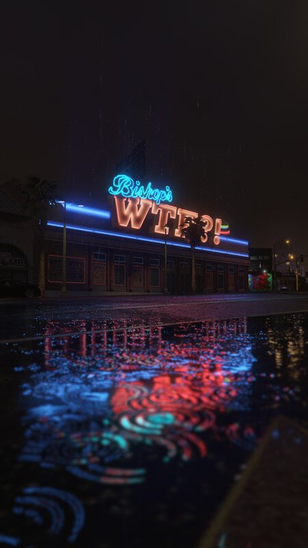 Neon Sign on Wet Street