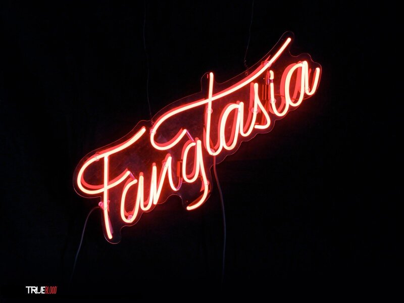 Neon sign reading 'Fantasia'
