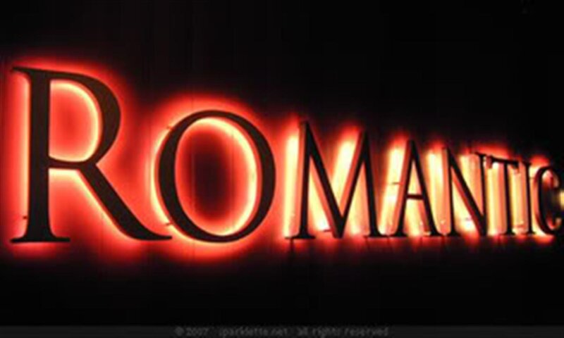 Neon Sign Reading ROMANTIC