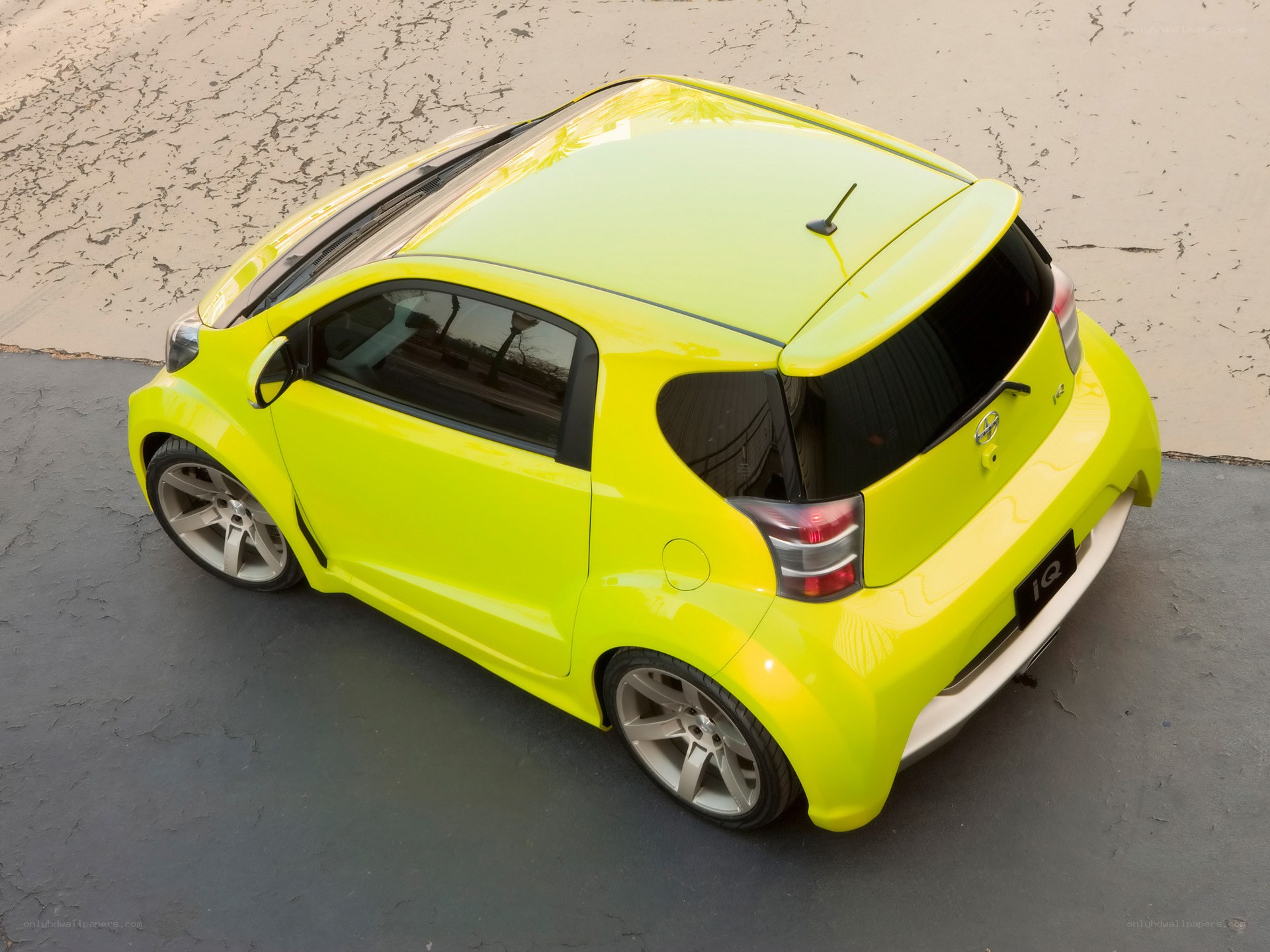 Neon yellow compact car