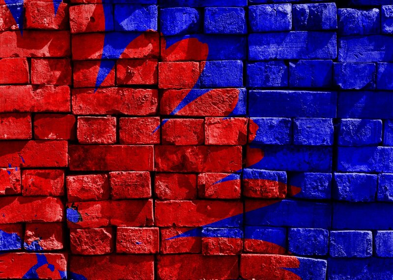 Nepal flag on brick wall