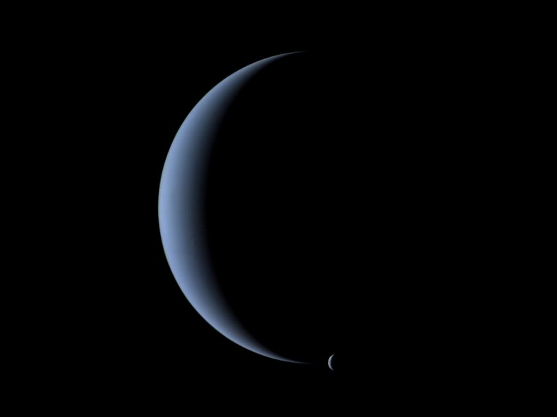 Neptune and Triton in space