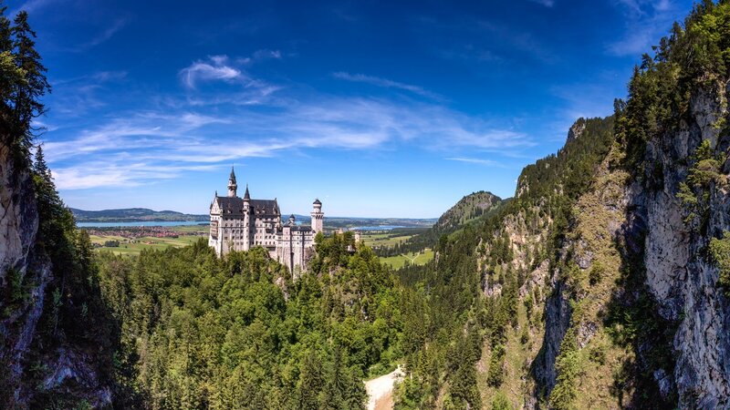 Neuschwanstein Castle — Blue, Serene, Afternoon, Photograph, Mountains, Forest, Lake