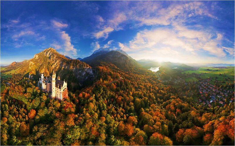 Neuschwanstein Castle — Blue, Serene, Autumn, Photograph, Mountains, Forest, Village