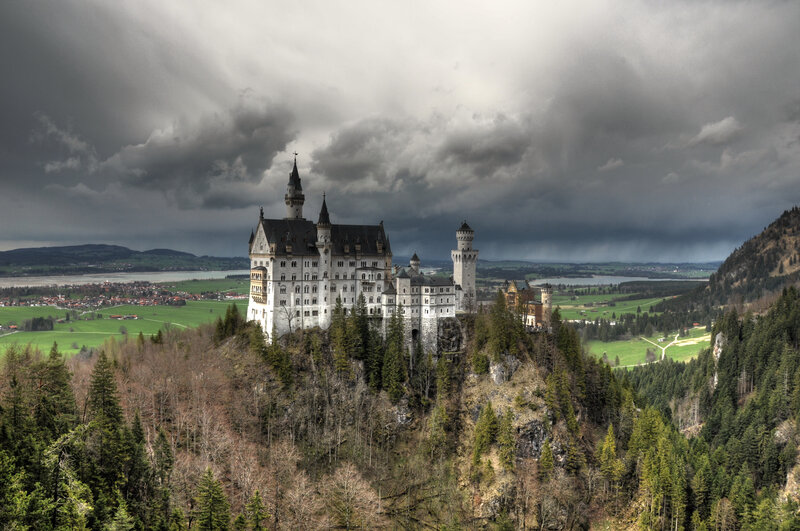 Neuschwanstein Castle under stormy sky