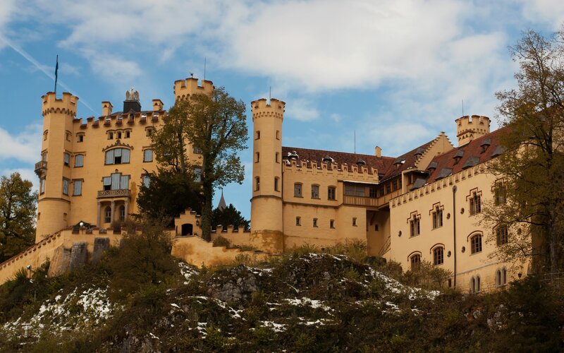 Neuschwanstein Castle — Yellow, Serene, Autumn, Photograph, Towers