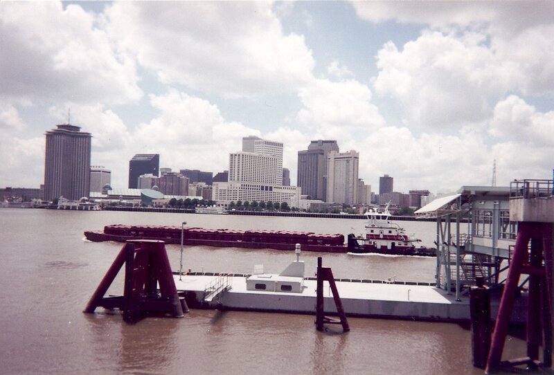 New Orleans skyline with river barge