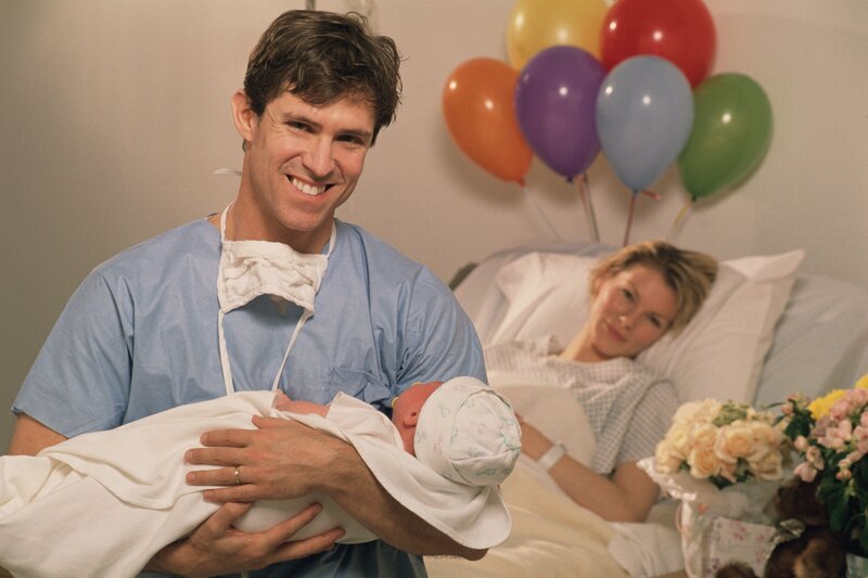 New parents with newborn baby