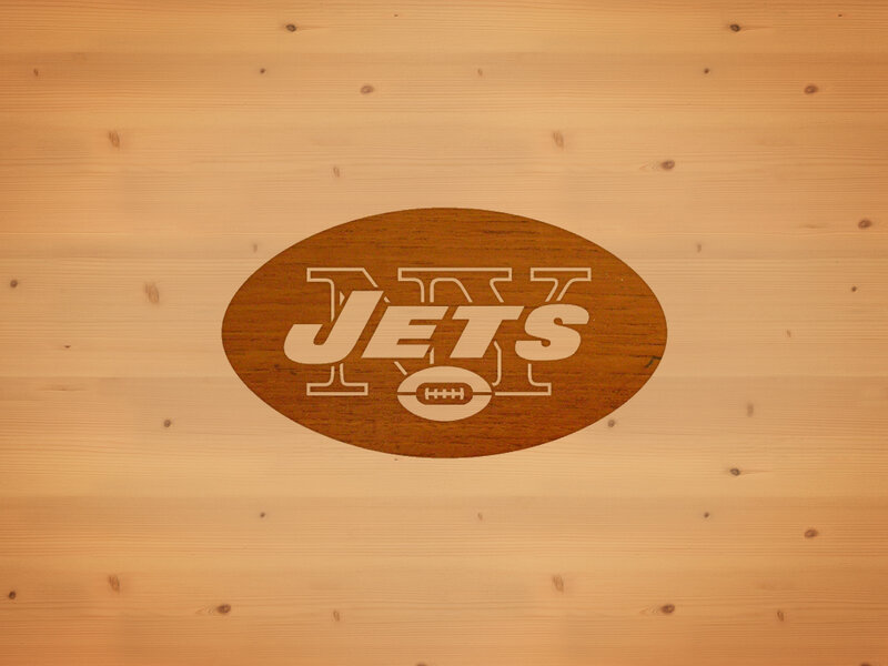 New York Jets logo on wood