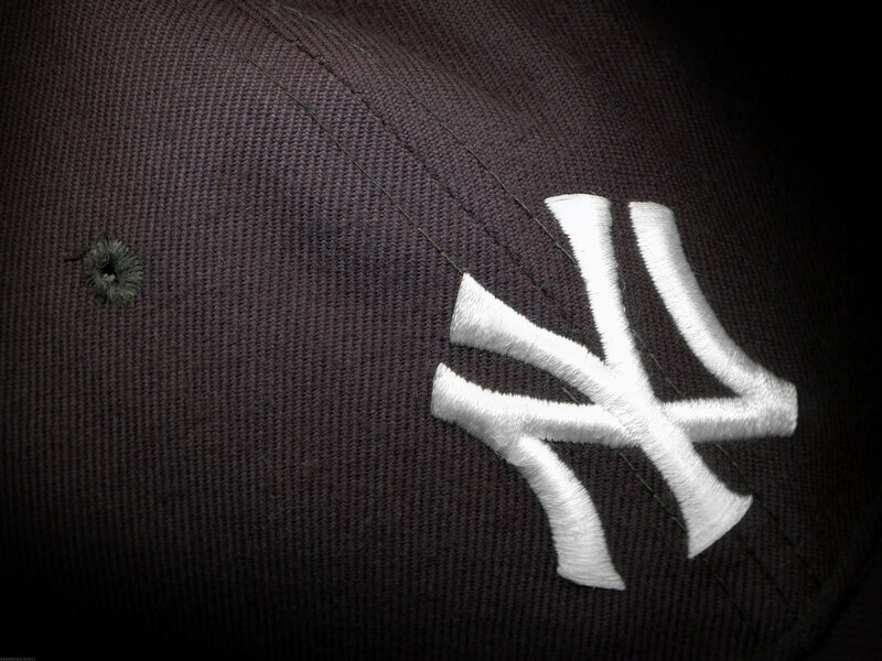 New York Yankees cap with hole