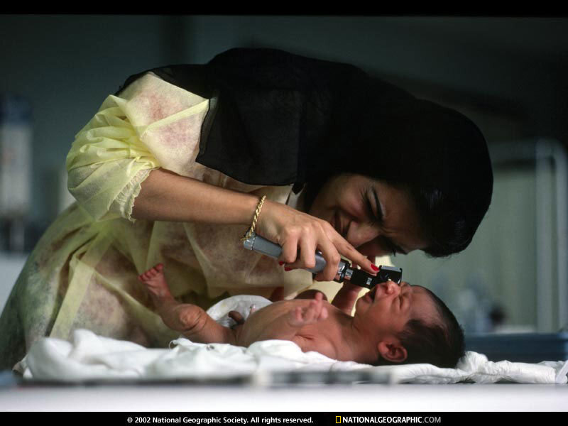 Newborn Baby Being Examined