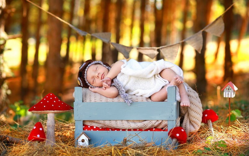 Newborn Baby in Bed — Blue, Serene