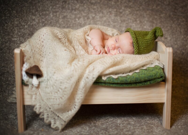 Newborn Baby in Bed — Green