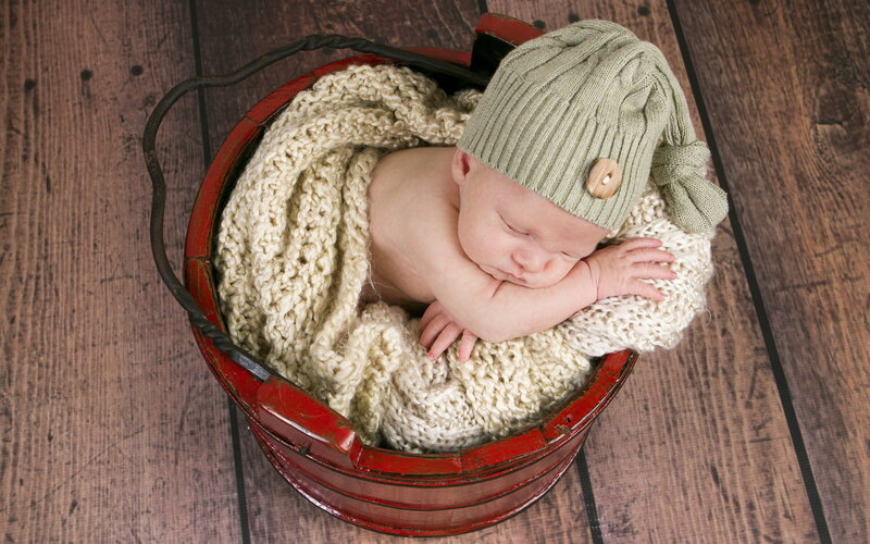 Newborn Baby in Bucket — Red