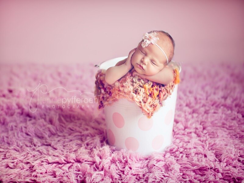 Newborn Baby in Bucket