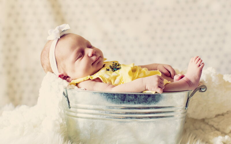 Newborn Baby in Tub
