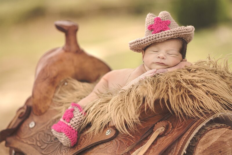 Newborn Baby on Saddle