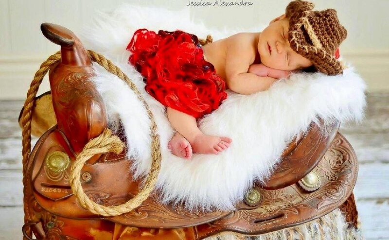Newborn Baby on Saddle — White