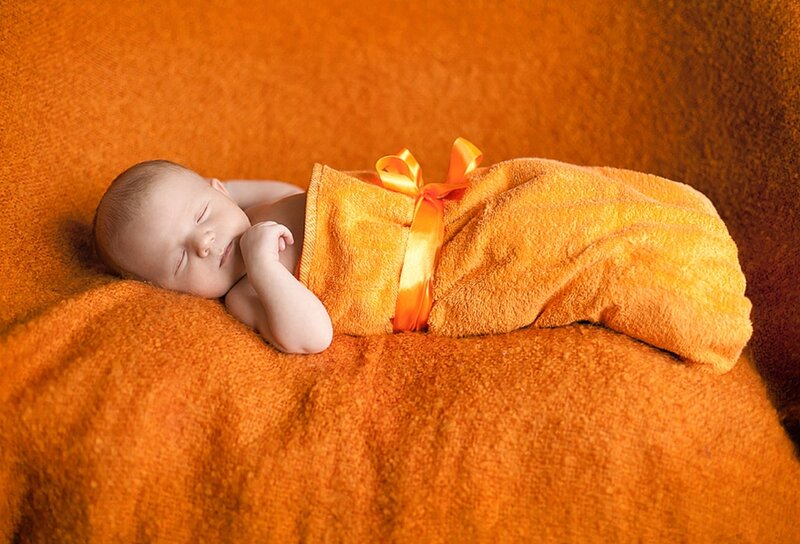 Newborn Baby Sleeping — Orange