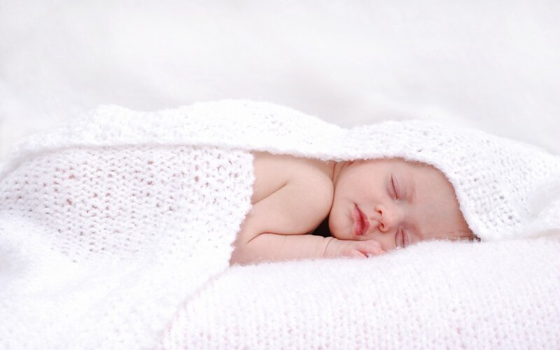 Newborn baby sleeping peacefully