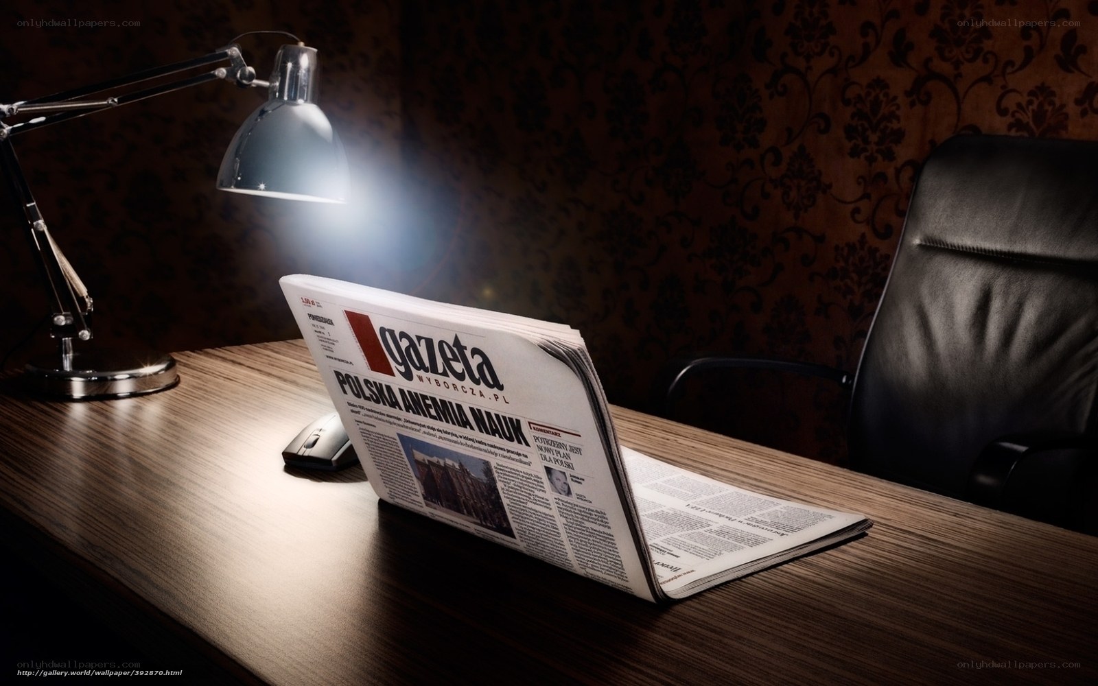Newspaper on a desk at night