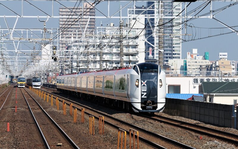 NEX train in urban setting