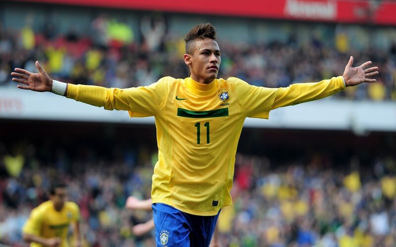 Neymar celebrates in Brazil jersey