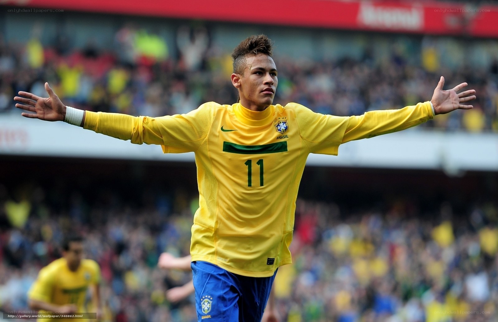 Neymar celebrates in Brazil jersey