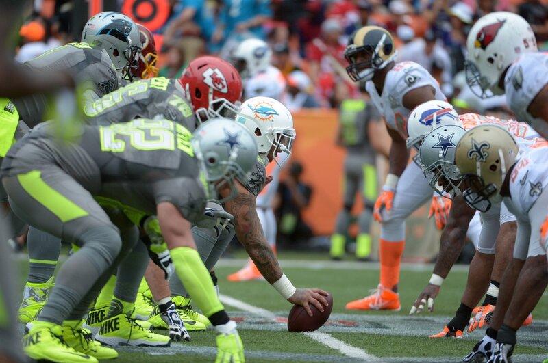 NFL players at line of scrimmage